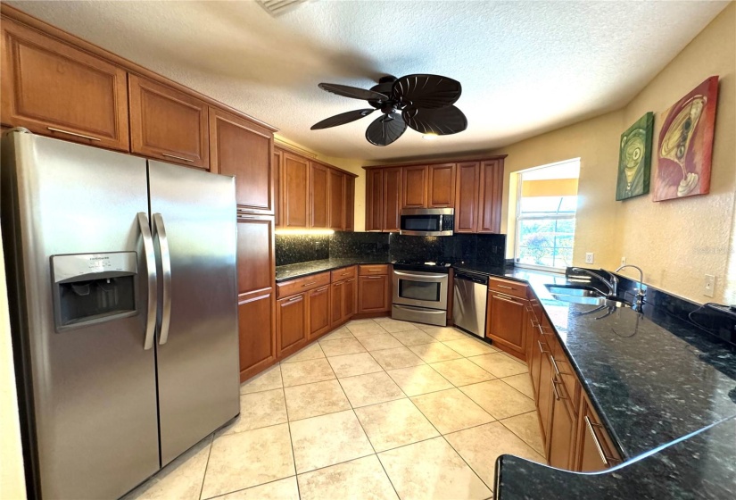 Kitchen with pass-through window to the pool