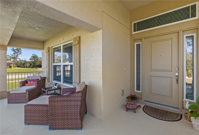 Large covered front porch perfect for relaxing.