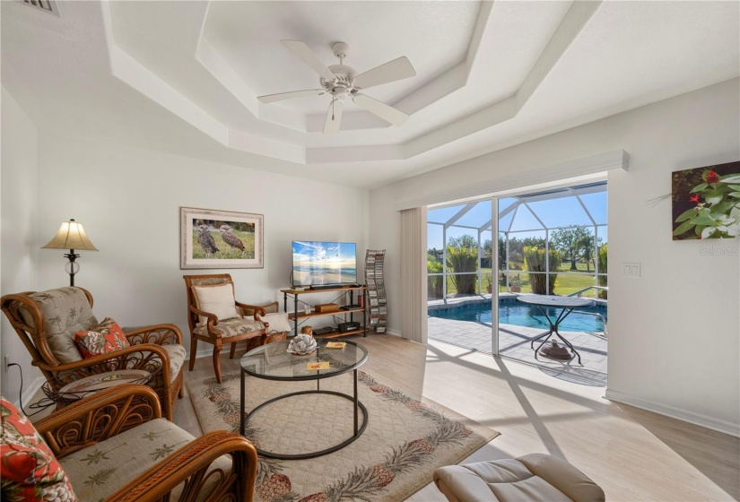 Family room opens to pool area and expansive yard