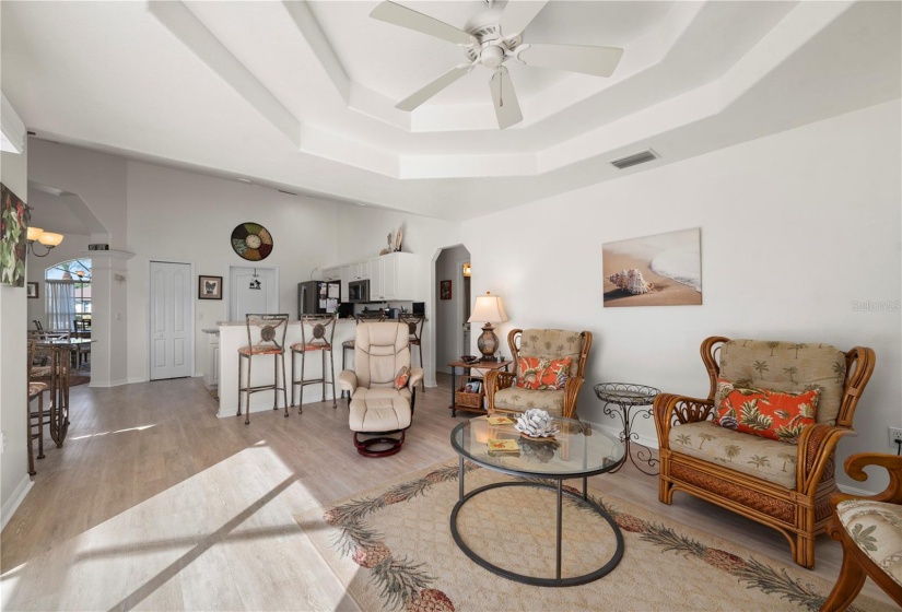 Family room has new durable vinyl plank flooring