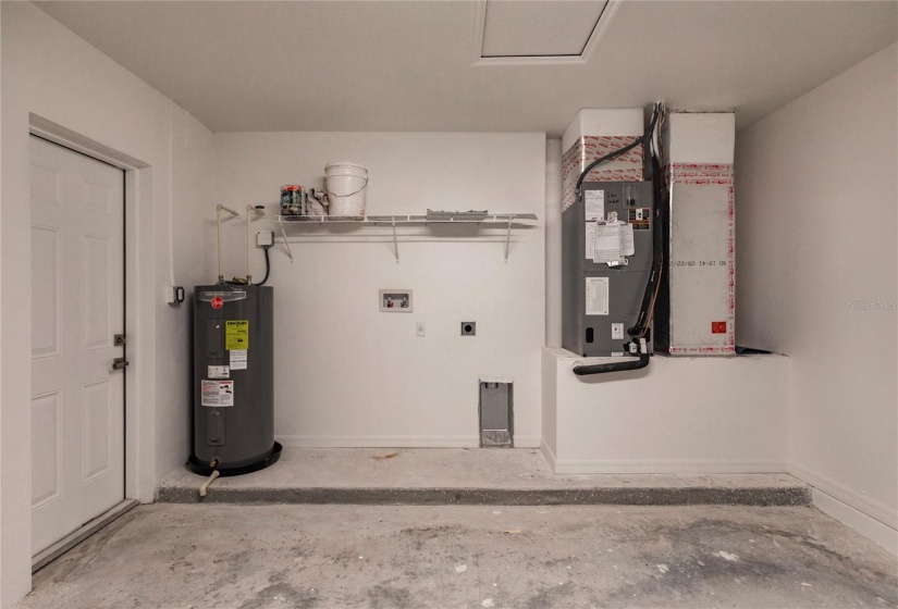 LAUNDRY AREA IN GARAGE