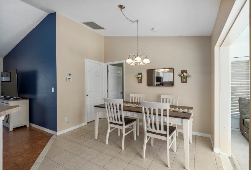 Door on the left leads to the laundry room and other door is primary bedroom