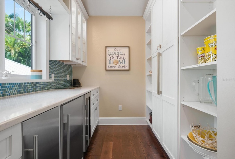 Butler's pantry with beverage refrigerator