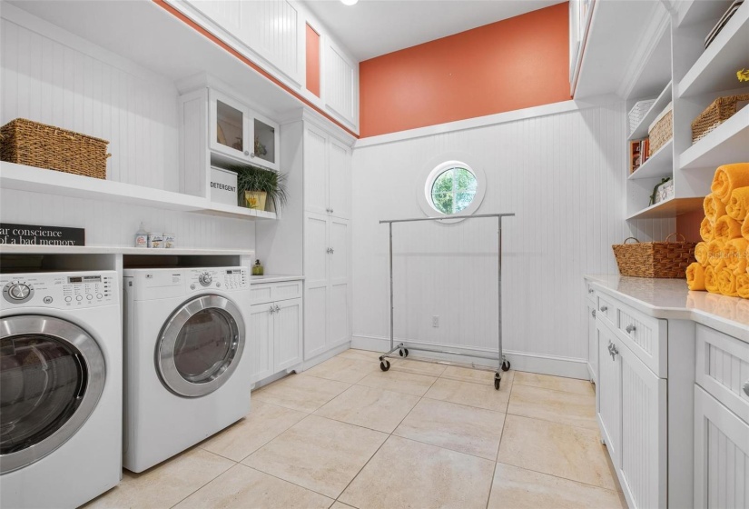 Laundry room with built in cabinetry, main level