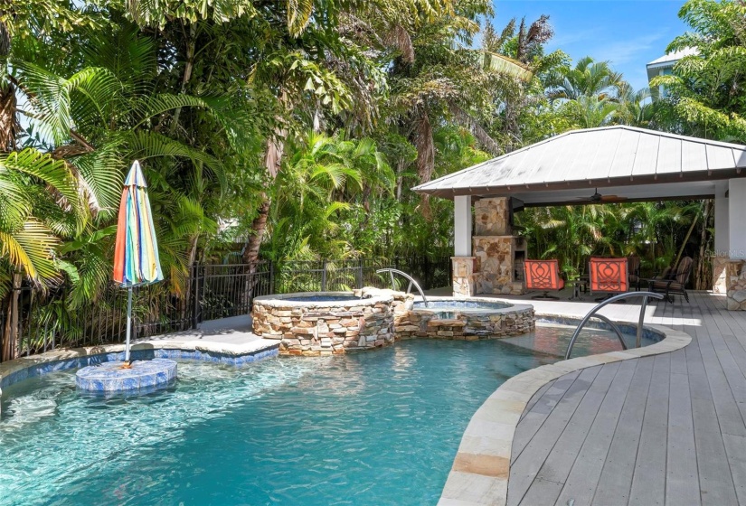 Heated pool and cabana with natural gas fireplace