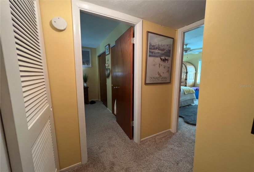 Hallway View of Bedrooms