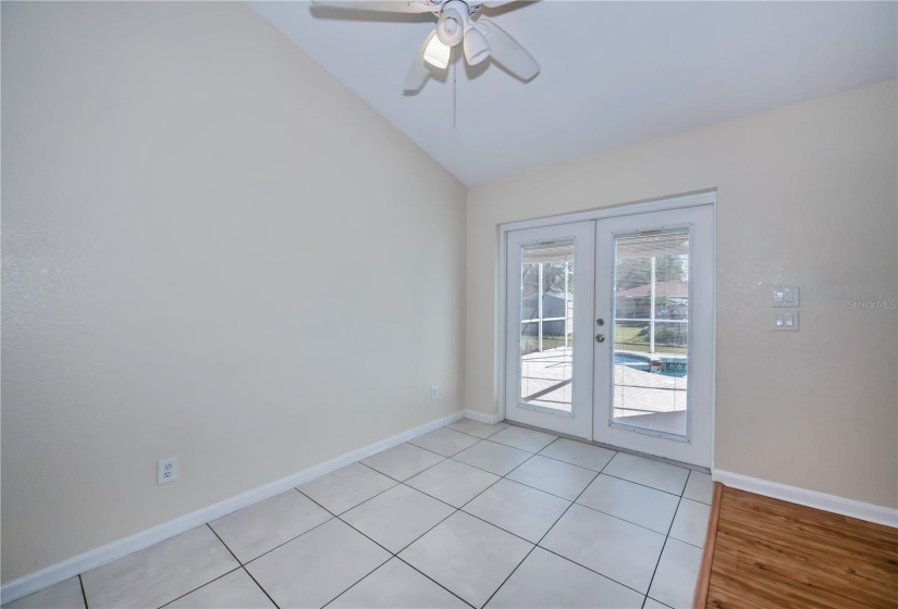 family room with double door pool access