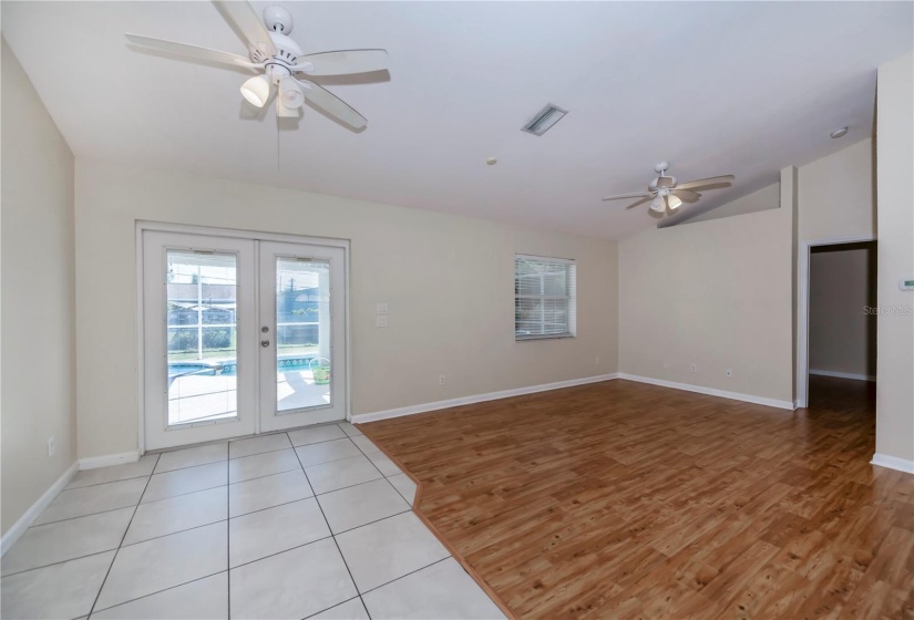 family room with double door pool access/ covered lanai