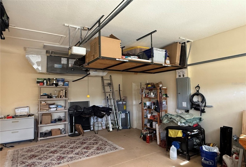 Garage has additional storage from ceiling