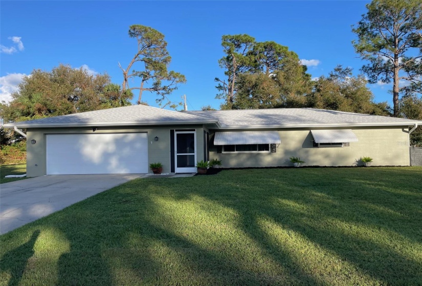 Home with AWNINGS!! Original window awnings offering both privacy and shade.