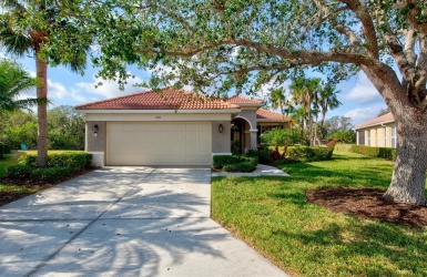 The home has beautiful curb appeal, located at the end of a peaceful cul-de-sac surrounded by water.