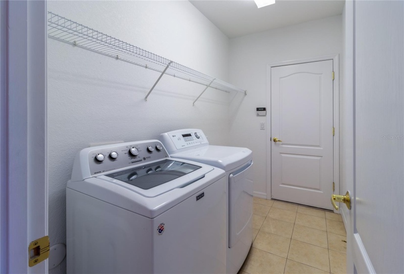 Washer and Dryer inside laundry room