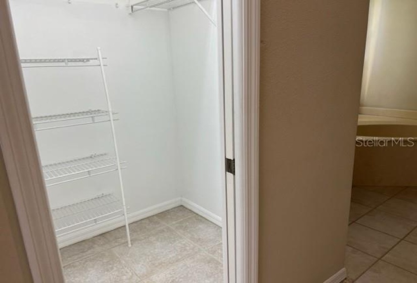 Walk- in with shelving