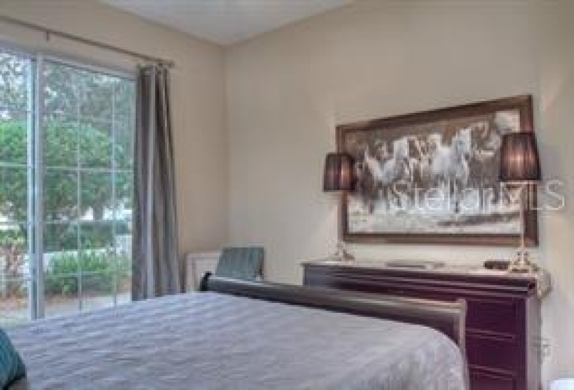 Guest Bedroom with Queen sze bed and TV