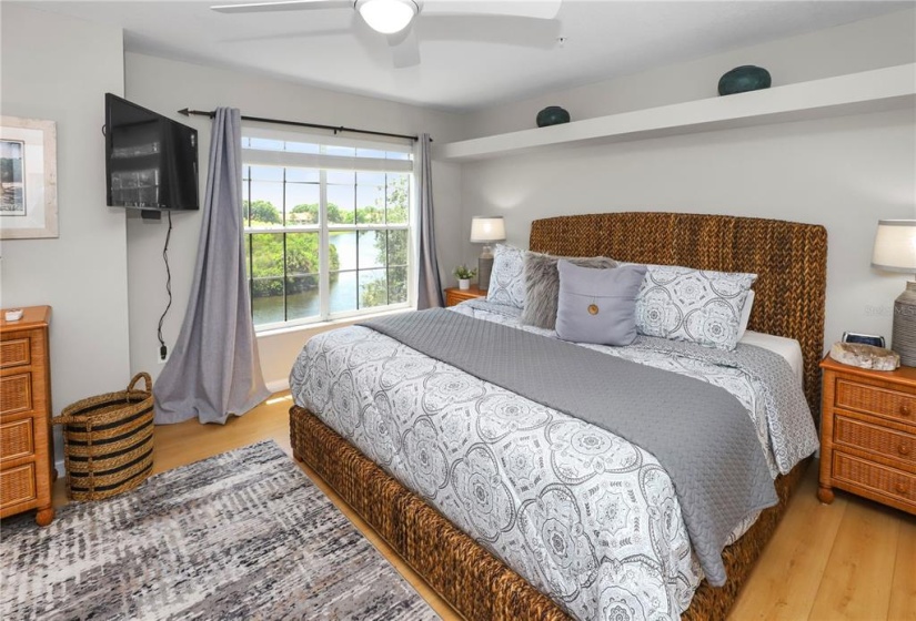 Main bedroom upstairs with water view with ensuite bathroom