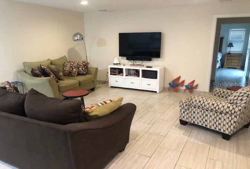 Family room with access to pool