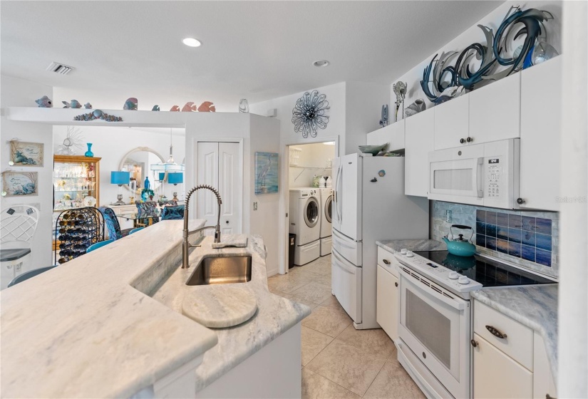 Kitchen featuring soap stone counter tops