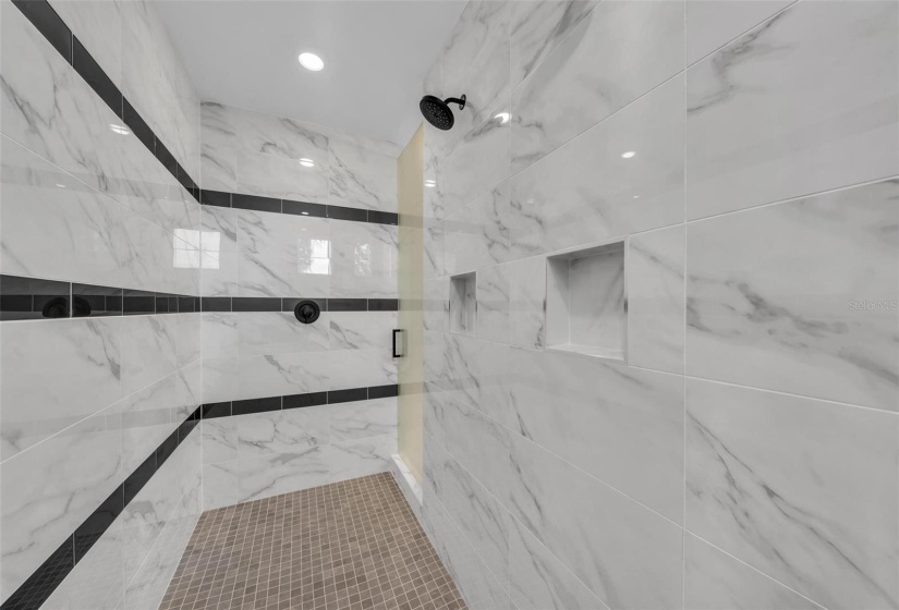 Walk through shower with dual shower heads