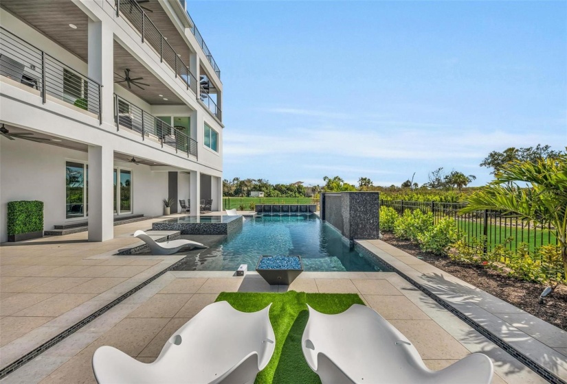 Salt water pool and porcelain paver deck.