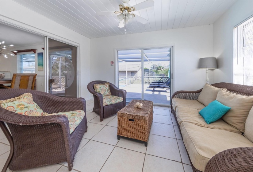 Bonus room off of primary bedroom and dining room overlooking the pool deck area.  Plenty of  natural lighting to take advantage of and to brighten up your day.