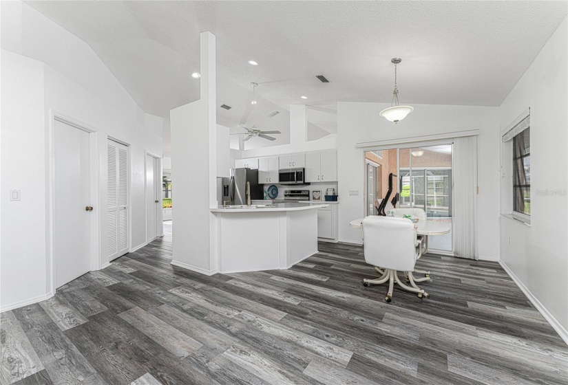 LOOKING TOWARDS HALLWAY, DINETTE & KITCHEN from FAMILY ROOM