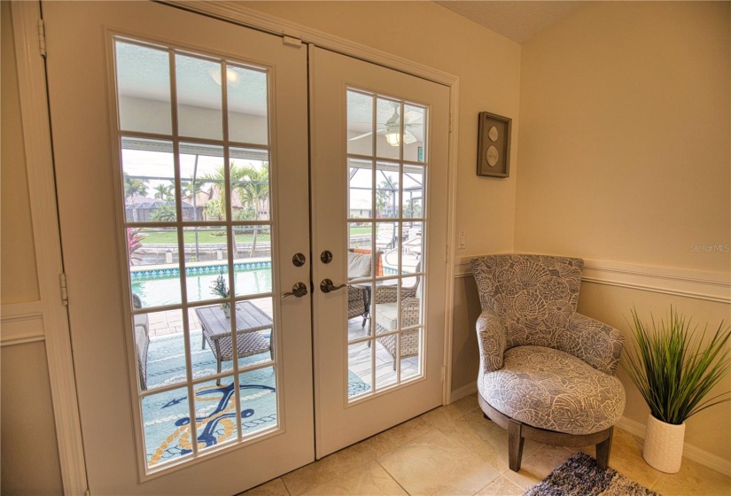 Living room with French doors to covered lanai