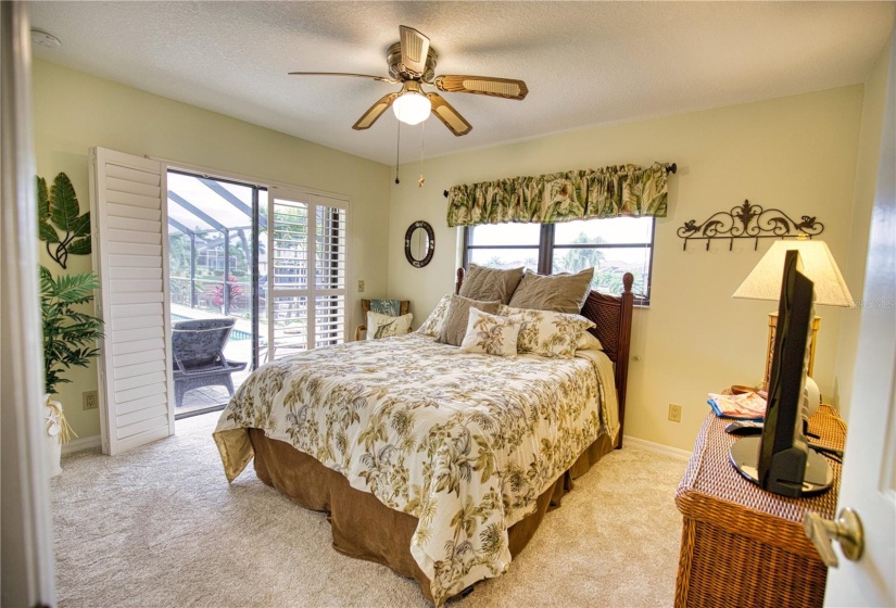 Second guest bedroom with canal & pool view