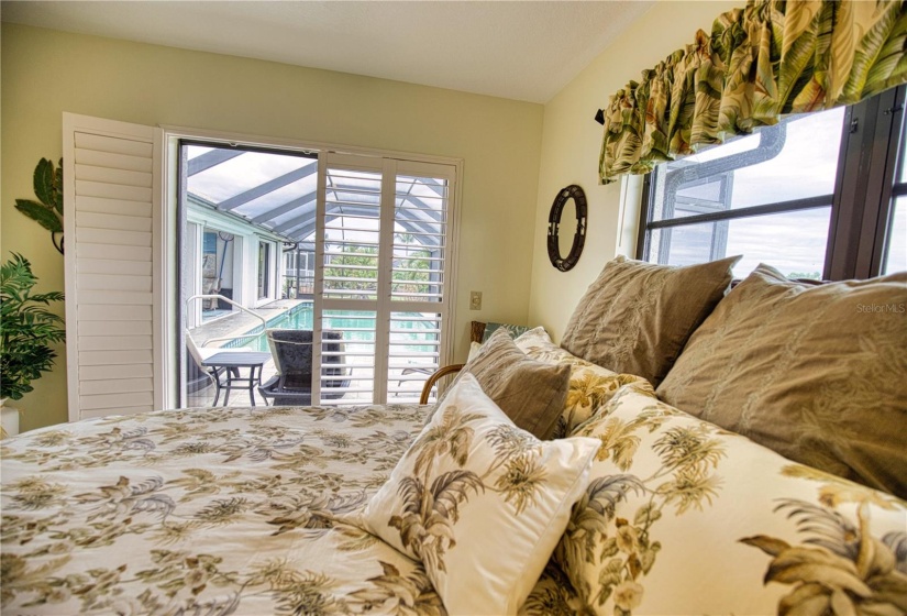 Second guest bedroom with canal & pool view