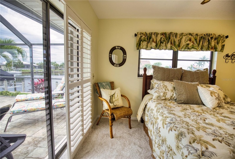 Second guest bedroom with canal & pool view